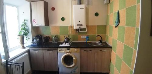 Kuchyň nebo kuchyňský kout v ubytování Apartments