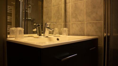 Koupelna v ubytování Hotel Marinet