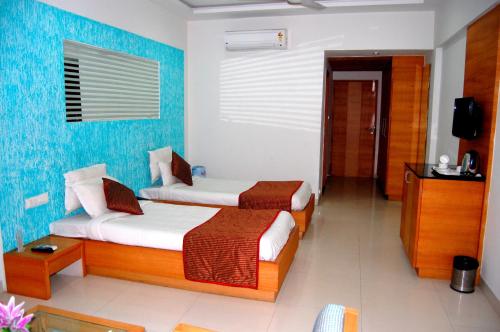 Ένα ή περισσότερα κρεβάτια σε δωμάτιο στο Ranbanka Heritage Resort
