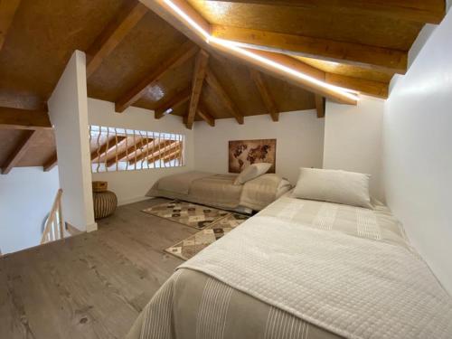 Ένα ή περισσότερα κρεβάτια σε δωμάτιο στο Casa do Toupeiro