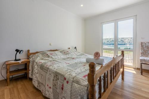 Postel nebo postele na pokoji v ubytování Apartments Lino