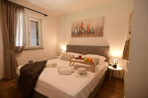 מיטה או מיטות בחדר ב-Luxury Apartment Vabriga
