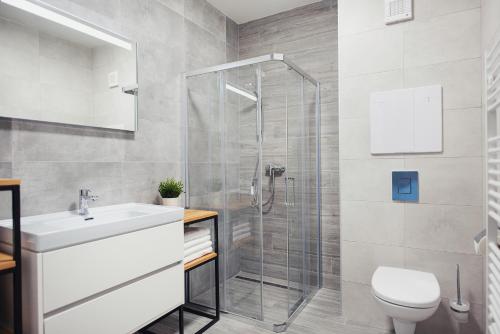 Phòng tắm tại Galeria Apartments - Jasná