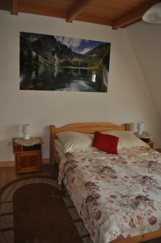 Ένα ή περισσότερα κρεβάτια σε δωμάτιο στο Pokoje u Marysi