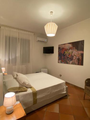 Een bed of bedden in een kamer bij Villa Sterlizia