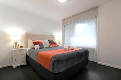 Ένα ή περισσότερα κρεβάτια σε δωμάτιο στο Apartments 521