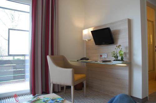 Телевизор и/или развлекательный центр в Parkhotel Bad Bevensen ,ThermePlus