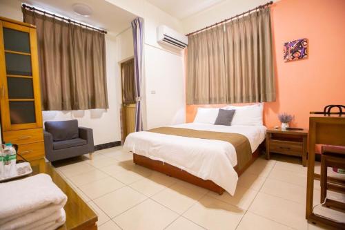 Cama o camas de una habitación en 阿鑫民宿