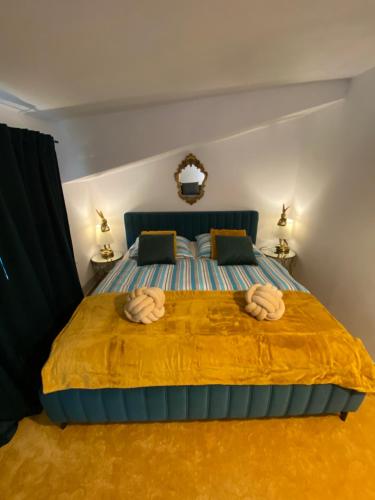a bedroom with a bed with two towels on it at Hrensko31 in Hřensko