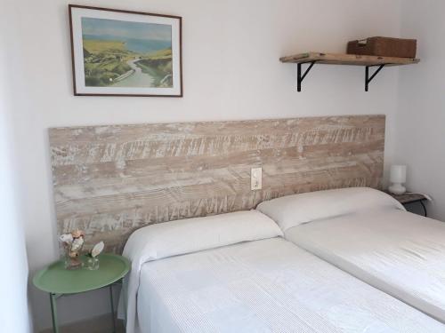 Postel nebo postele na pokoji v ubytování Ático El Rinconcillo