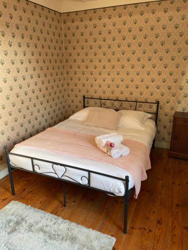 Katil atau katil-katil dalam bilik di Maison de maître LA ROSERAIE avec parc arboré