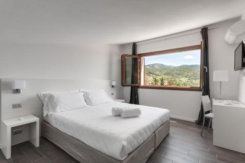 Llit o llits en una habitació de The Florence Hills Resort & Wellness