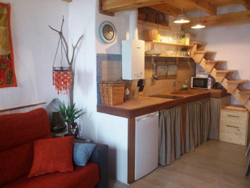 A kitchen or kitchenette at Casa con encanto en Valdelarco