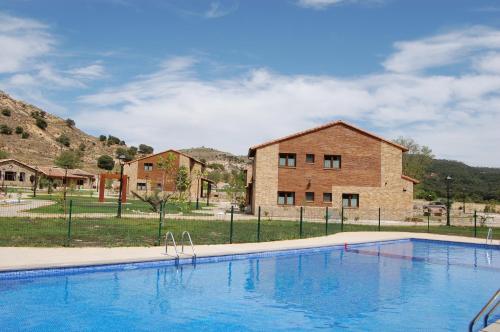 Swimming pool sa o malapit sa Las Villas de Fuentidueña