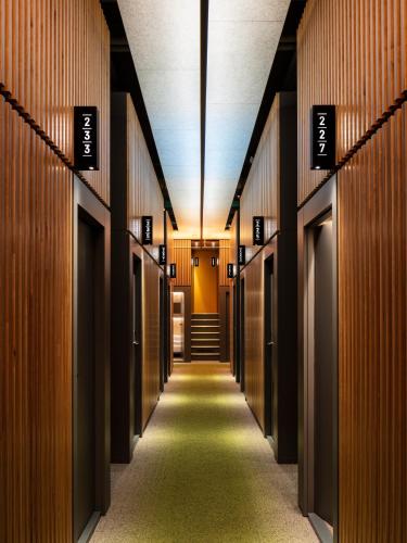 a hallway in a building with a row of lockers at CAB20 in Hamburg