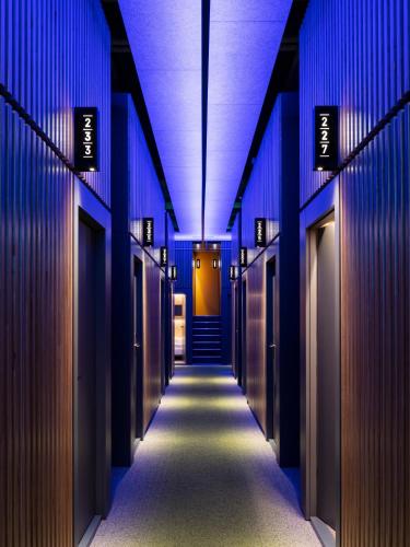 a hallway of a building with blue lights at CAB20 in Hamburg