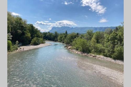 a view of a river from a bridge at Les Lauriers d'Aimée pour 4 pers in Mirabel-et-Blacons