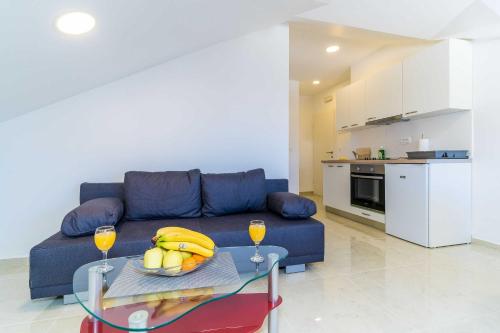 Η κουζίνα ή μικρή κουζίνα στο Apartments Šmanjak