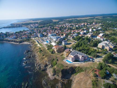 an aerial view of a resort next to the water at Casa Paradiso Apartments in Ahtopol