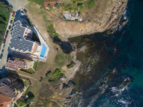 an aerial view of a house next to the ocean at Casa Paradiso Apartments in Ahtopol