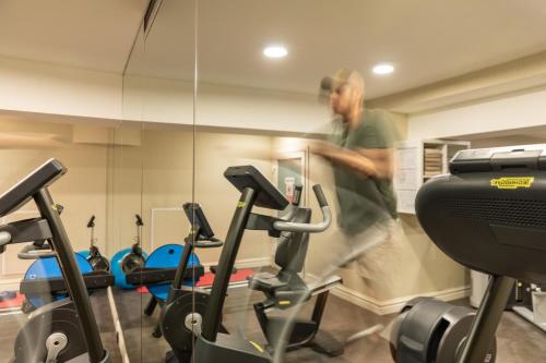 a man in a gym with several exercise bikes at Romance Istanbul Hotel Boutique Class in Istanbul