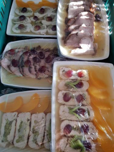 four plastic containers filled with different types of food at The Narrows in Portaferry