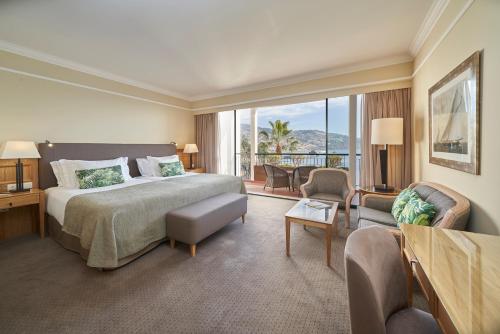 Кровать или кровати в номере The Cliff Bay - PortoBay