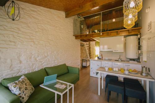 Η κουζίνα ή μικρή κουζίνα στο roomPEDRA apartamentos turísticos