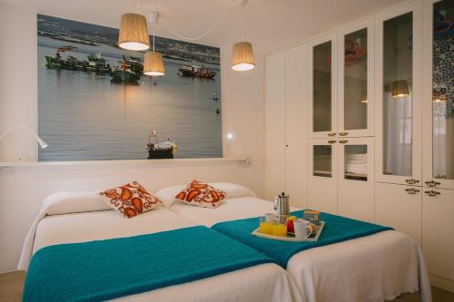 Postel nebo postele na pokoji v ubytování roomPEDRA apartamentos turísticos