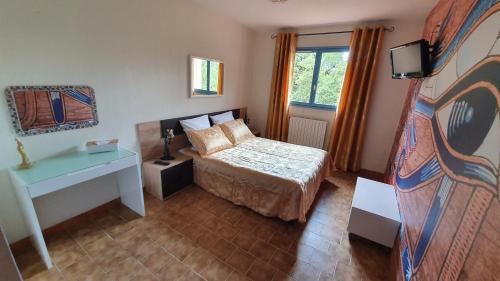Postel nebo postele na pokoji v ubytování Horus Hôtel