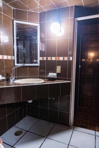 Ein Badezimmer in der Unterkunft Hotel Hacienda de Cobos