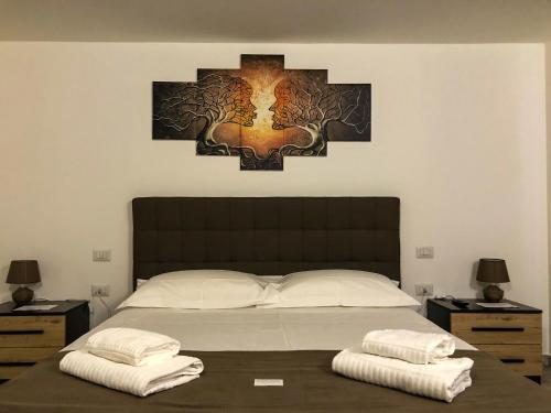 Posteľ alebo postele v izbe v ubytovaní Attico Danivinci