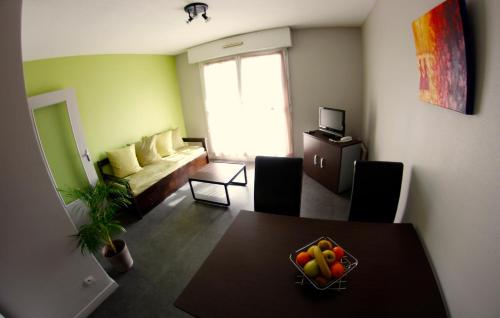 Ruang duduk di Appart'hotel Les Palatines
