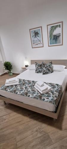 a large bed in a room with at Christian Guest House in Terrasini