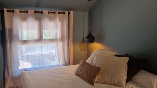Tierra Boutique, Tierra Suites y Tierra Valles Apartamentosにあるベッド