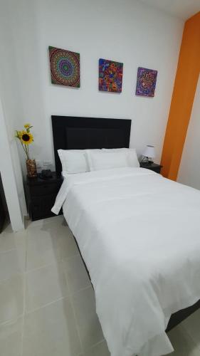 Katil atau katil-katil dalam bilik di Hotel boutique turquesa