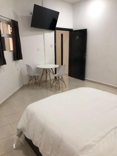 Katil atau katil-katil dalam bilik di Hotel boutique turquesa