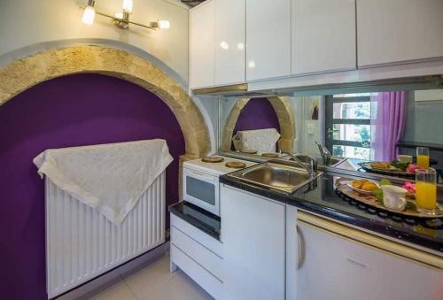 Kuchyň nebo kuchyňský kout v ubytování Villa Iasonas