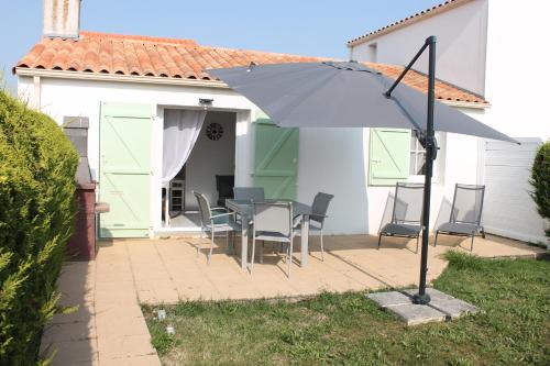 Photo de la galerie de l'établissement Maison Les Embruns avec piscine collective, à La Faute-sur-Mer