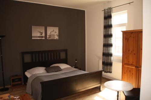 Кровать или кровати в номере Deutsches Haus