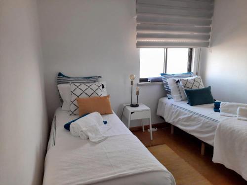 Ένα ή περισσότερα κρεβάτια σε δωμάτιο στο Lila Ocean View Apartment