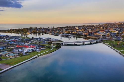 a marina filled with lots of boats on a cloudy day at Ulverstone River Edge HolidayApartments in Ulverstone