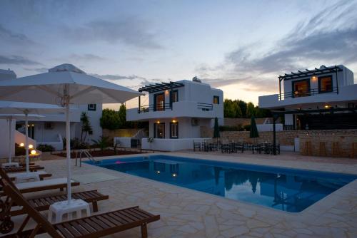The swimming pool at or close to Cavo Plako Villas