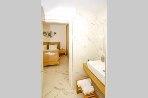 Kylpyhuone majoituspaikassa Mare Monte Luxury Apartment