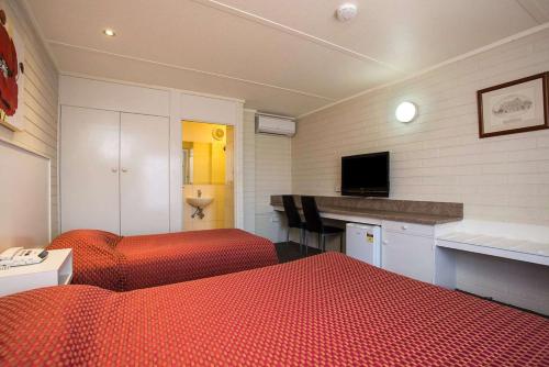 Katil atau katil-katil dalam bilik di Econo Lodge Portland