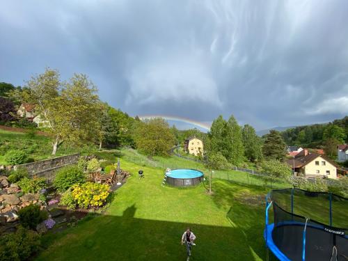 an aerial view of a garden with a trampoline at Ubytování na Čechách in Děčín