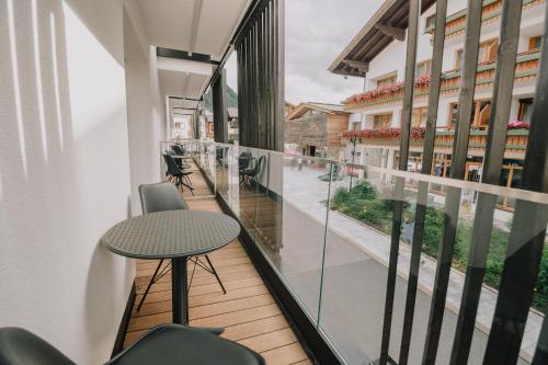 Ein Balkon oder eine Terrasse in der Unterkunft The Place Boutique & Design Hotel Flachau