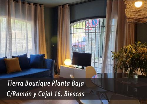 Tierra Boutique, Tierra Suites y Tierra Valles Apartamentosにあるテレビまたはエンターテインメントセンター