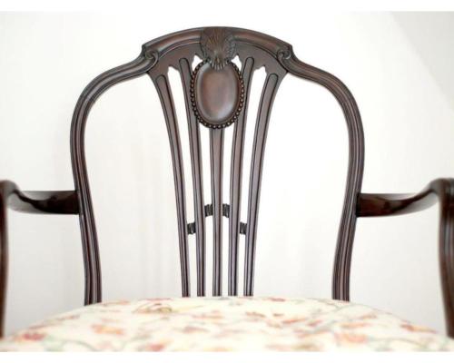 a chair with a floral seat in a room at The Osney Arms Guest House in Oxford