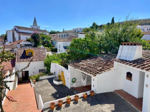 a view from the roof of a house at Pátio da Muralha in Óbidos